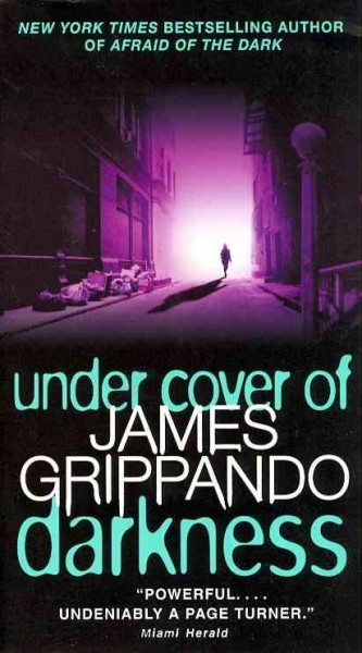 Under cover of darkness / James Grippando.